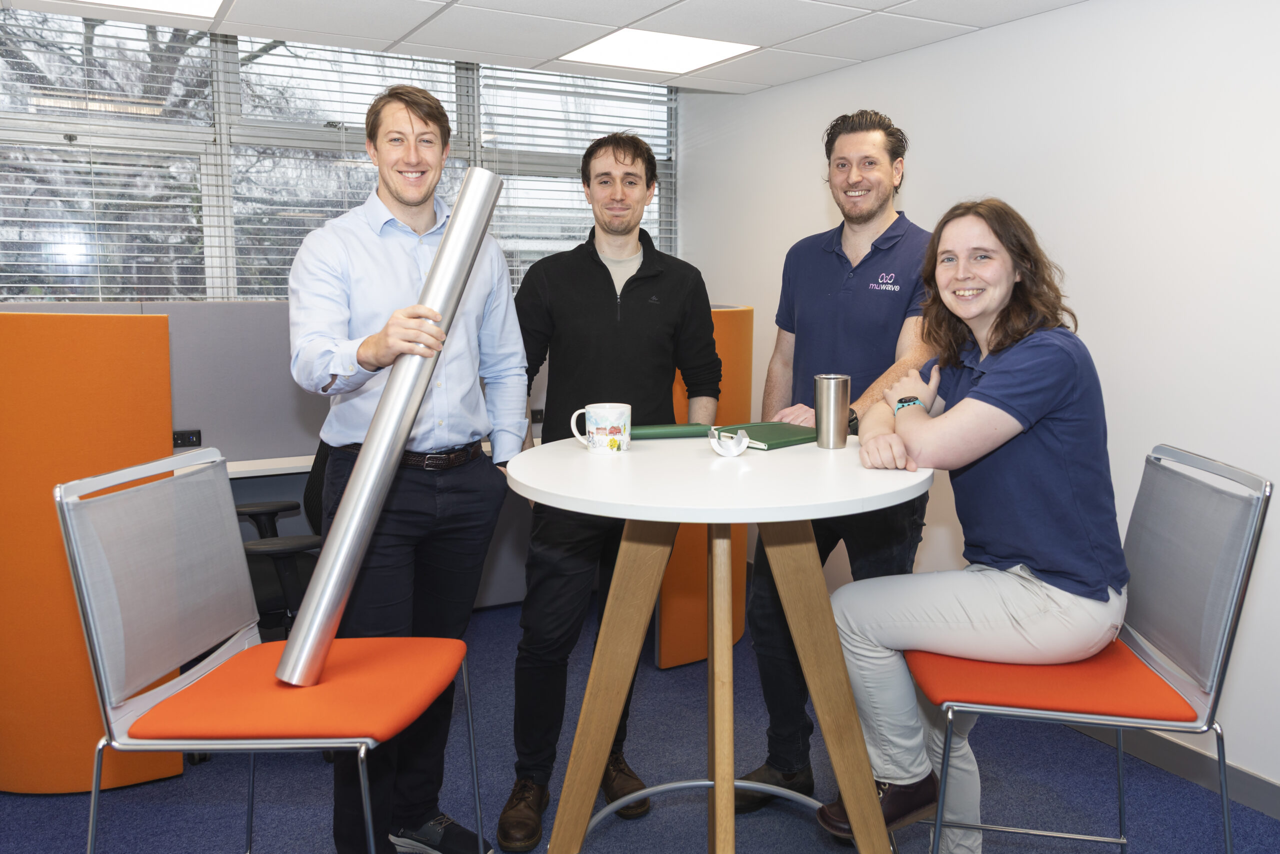 MuWave team (L-R): Ben Pritchard (Microwave Engineer) with sample microwave waveguide, Gabriel Blackett (Microwave Engineer), Steven Craig (Co-Founder), Helen Webster (Co-Founder) - Image credit: United Kingdom Atomic Energy Authority