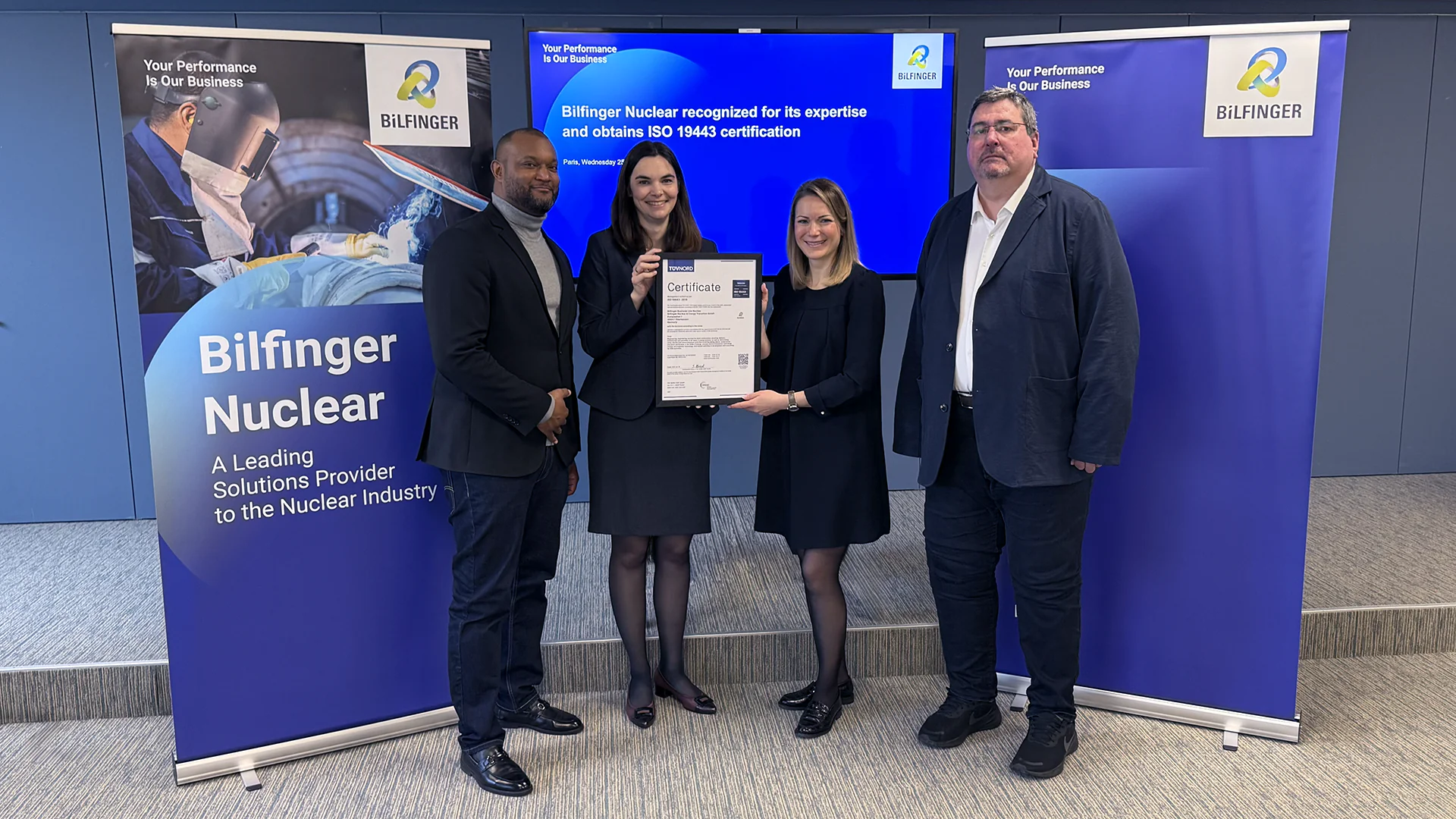 From left to right: Regis Nouvier, VP Business Line Nuclear - Consulting Services at Bilfinger, Dr. Eileen Langegger, Lead Auditor at TÜV NORD CERT, Caroline Sagne, President Business Line Nuclear at Bilfinger, Dr. Iulian Mircea Head of Quality Management Business Line Nuclear at Bilfinger.