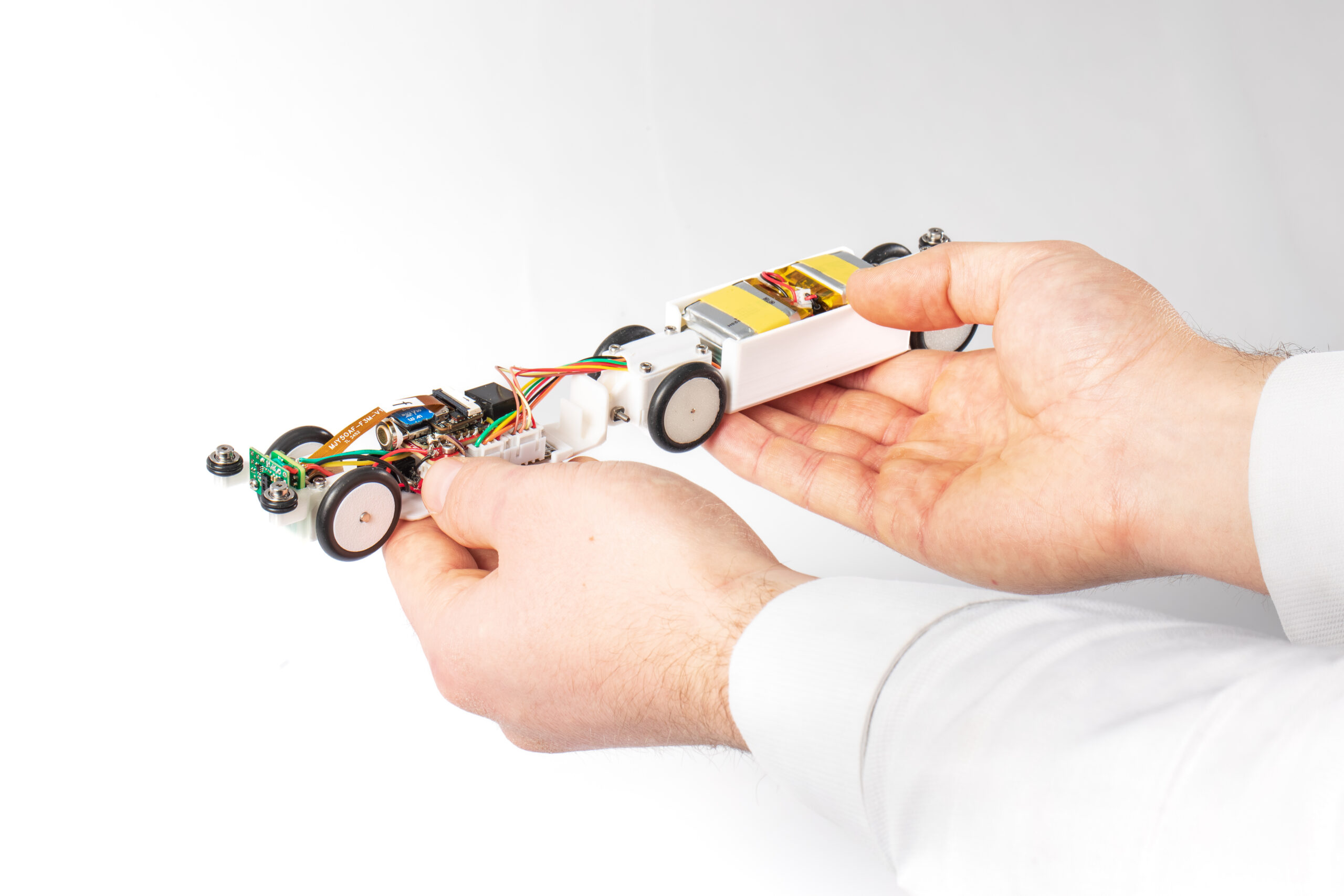 ‘PipeINEER’ small autonomous robot held in operator's hand - Image credit: © United Kingdom Atomic Energy Authority